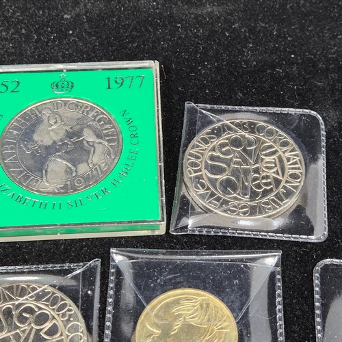 43 - A Collection of Twelve UK Commemorative Coins to include £5 coins, £2 coins etc