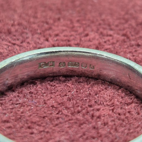 78 - A 9ct White Gold Wedding Band (4.7g), a Platinum Wedding Band (3.23g) and a Yellow Metal Baby's Brac... 