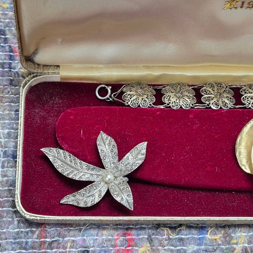 77 - A Mixed Lot of Costume and Vintage Jewellery including brooches, earrings, pendants, rings and neckl... 