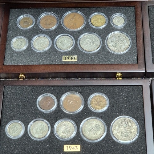 74 - British Coins of World War II set (1939-1945) A complete 7-drawer collector's cabinet containing Bri... 
