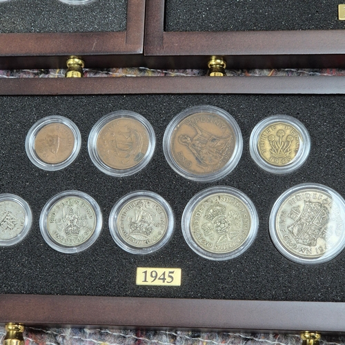 74 - British Coins of World War II set (1939-1945) A complete 7-drawer collector's cabinet containing Bri... 