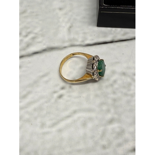21A - A Hallmarked George Christou 18ct Gold Emerald (approx 3ct) and Diamond Ring Size K (4.3g)