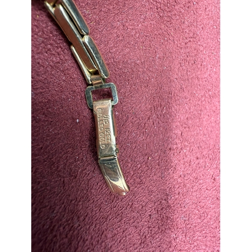 22I - A 9ct Yelow Gold Ladies Longines Wrist Watch On A 12ct Rolled Gold Bracelet, Swiss Made Manual Windi... 