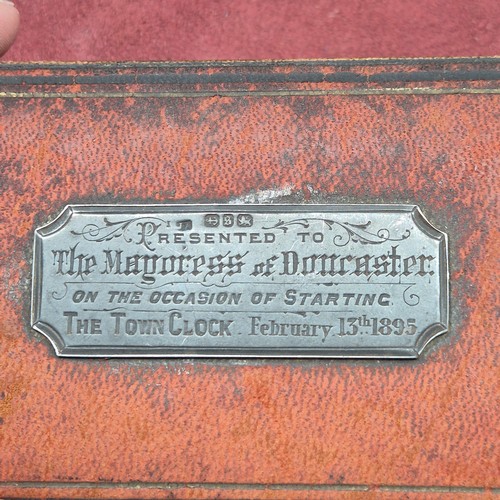 22J - A Cased Clock Key with Hallmarked Silver Plaque to 