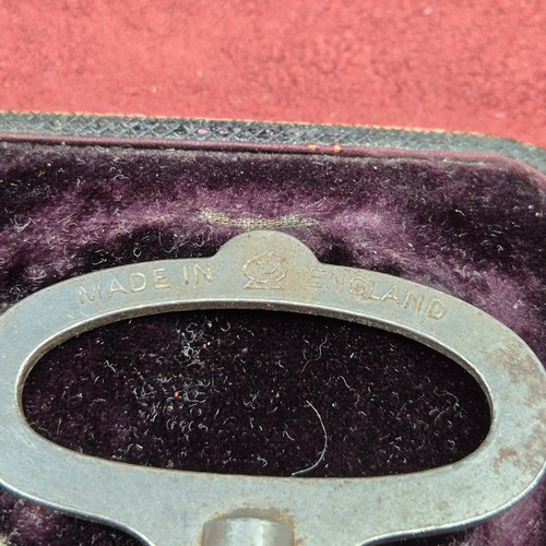 22J - A Cased Clock Key with Hallmarked Silver Plaque to 