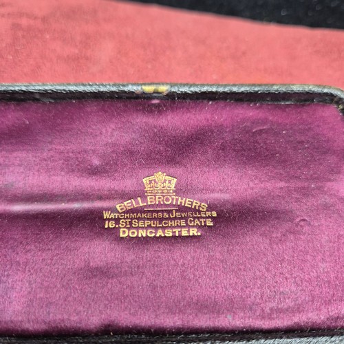 22J - A Cased Clock Key with Hallmarked Silver Plaque to 