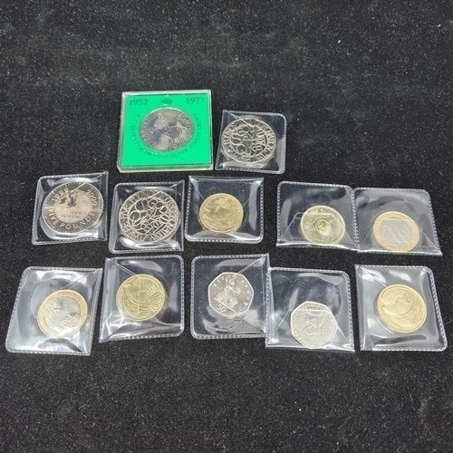 43 - A Collection of Twelve UK Commemorative Coins to include £5 coins, £2 coins etc