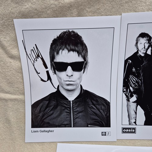 213 - Oasis - Three Official Promotional Photos Signed by Liam Gallagher
