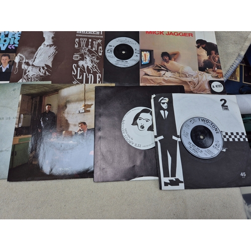 141 - A Collection of approx 20 Vinyl Singles