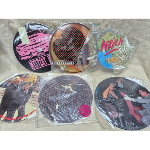 142 - Six Vinyl Picture Discs to include Toto - Africa and others