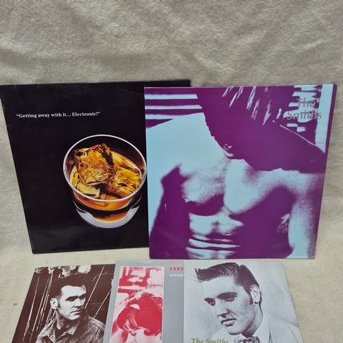 123 - The Smiths - A Mixed Lot to include The Smiths Debut Album, and a Collection of Vinyl Singles by The... 