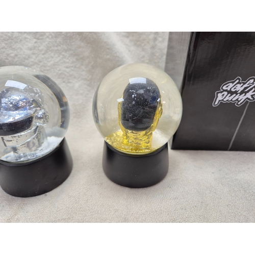 203 - Daft Punk - A Pair of Boxed Helmet Snow Globes