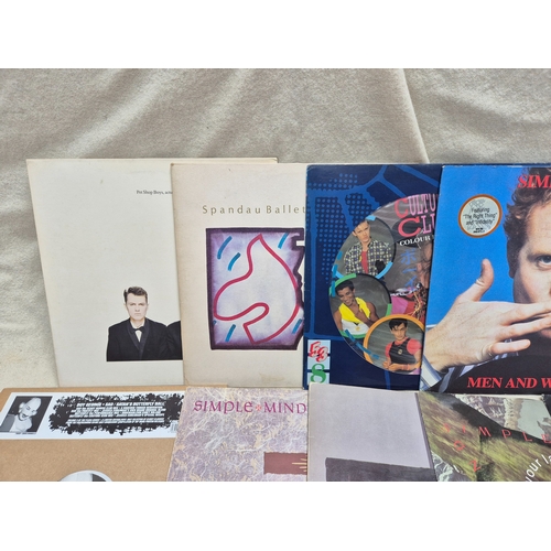 146 - A Mixed Lot of Vinyl Records and Singles