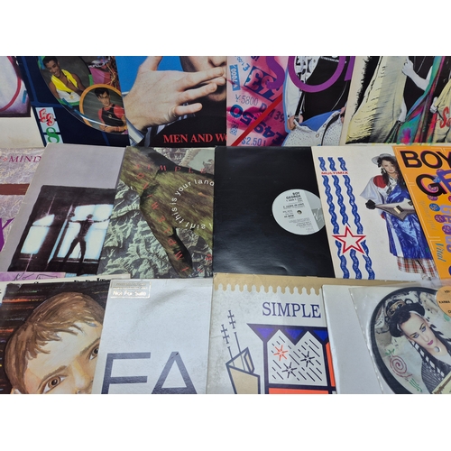 146 - A Mixed Lot of Vinyl Records and Singles