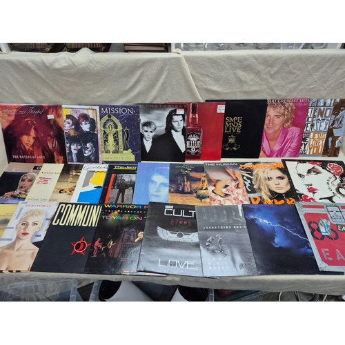 147 - A Good Collection of Vinyl Records to include Eurythmics, Dire Straits and others