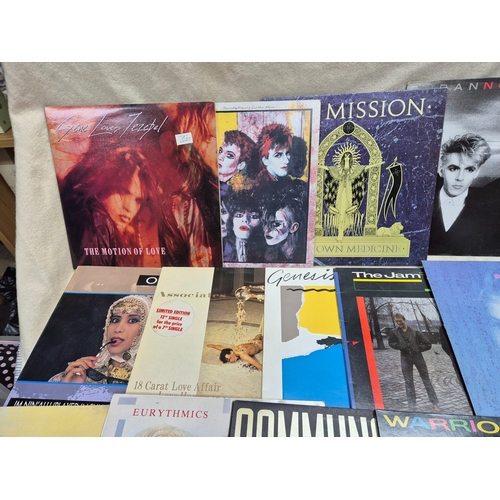 147 - A Good Collection of Vinyl Records to include Eurythmics, Dire Straits and others