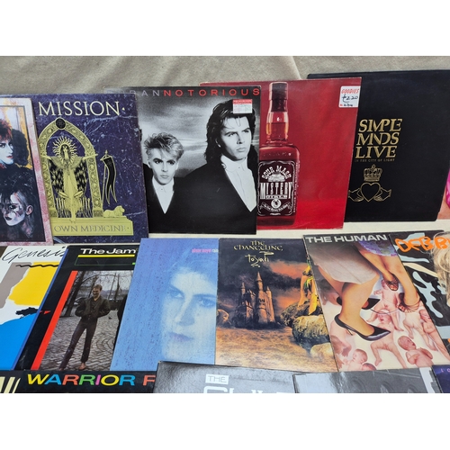 147 - A Good Collection of Vinyl Records to include Eurythmics, Dire Straits and others