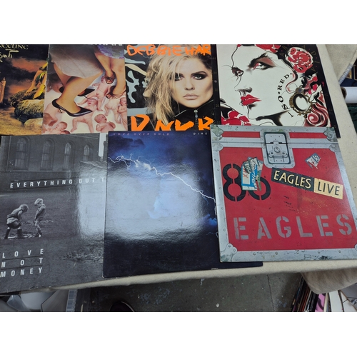 147 - A Good Collection of Vinyl Records to include Eurythmics, Dire Straits and others