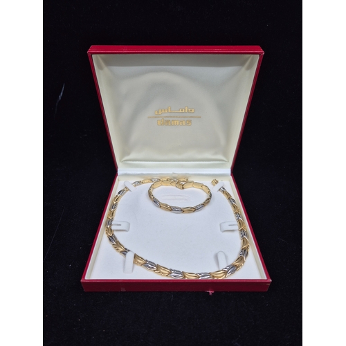 An 18ct Gold Necklace and Bracelet Set 51.2g
