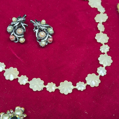 86 - Two Mother of Pearl Necklaces together with Two Pairs of Vintage Clip on Earrings