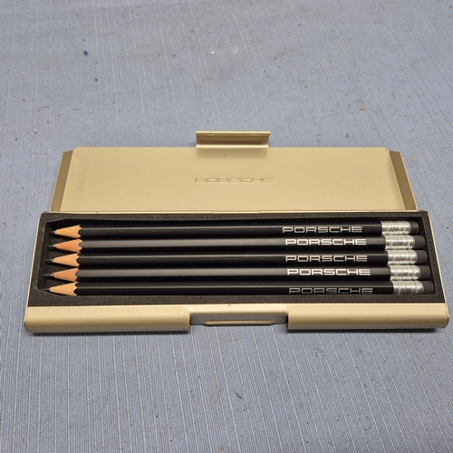 83 - A Set of Four Porsche Branded Pencils in Case