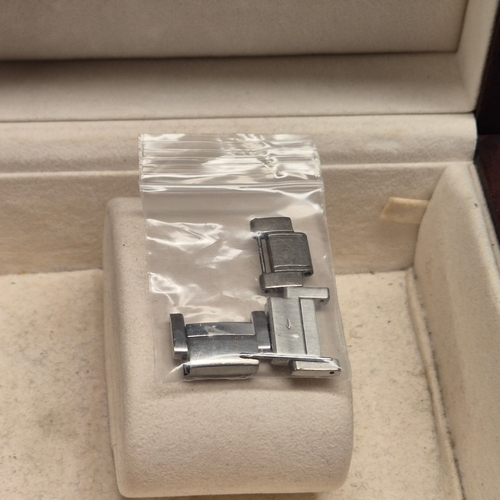 95 - A Genuine Omega Branded Watch Box together with some Links for a Strap