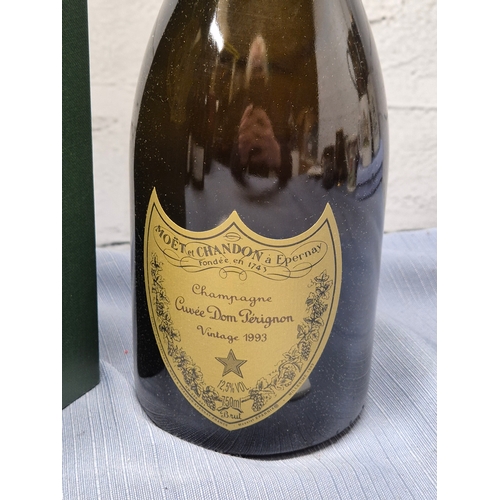 730 - A 75cl Bottle of Dom Perignon 1993 Champagne with Box and Booklet