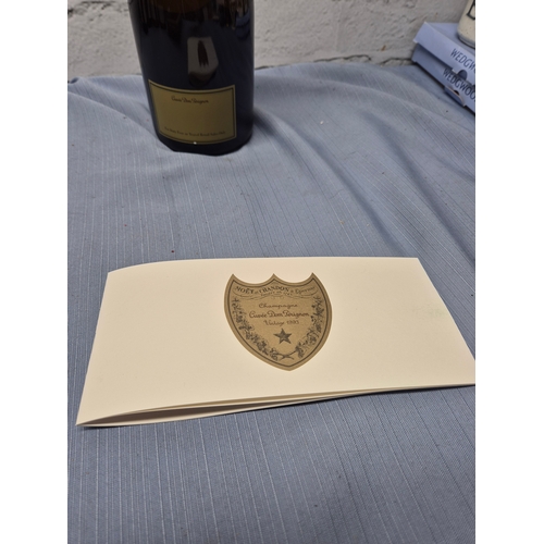 730 - A 75cl Bottle of Dom Perignon 1993 Champagne with Box and Booklet