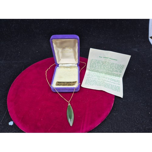 54 - A Yellow Metal Necklace with New Zealand 