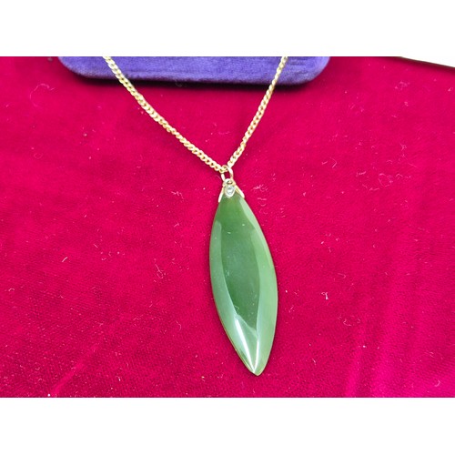 54 - A Yellow Metal Necklace with New Zealand 