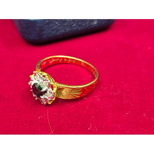 59 - An 18ct Gold Diamond and Sapphire Cluster Ring (approx. 4g)