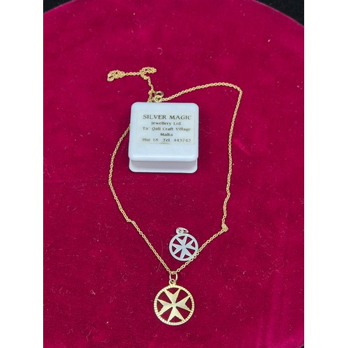 61 - A Silver Gilt Maltese Cross Pendant with Chain (approx 3.1g) together with a White Metal example
