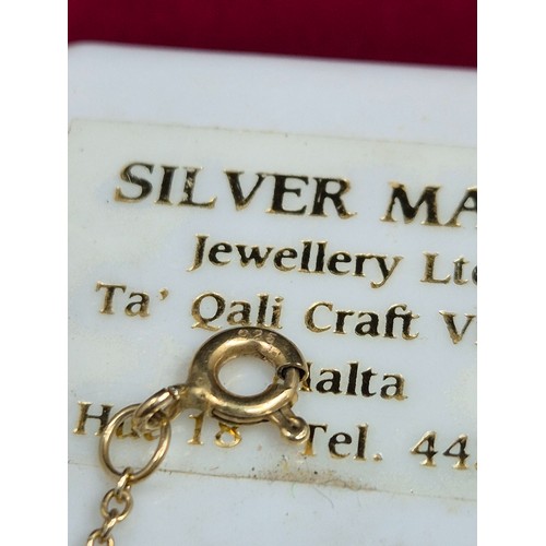 61 - A Silver Gilt Maltese Cross Pendant with Chain (approx 3.1g) together with a White Metal example