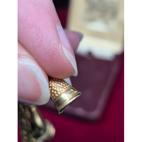 69 - A 9ct Gold Charm Bracelet (Gold Weight approx 15g)