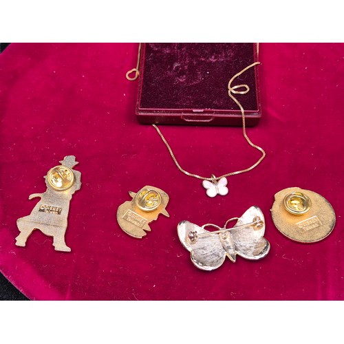 73 - A Mixed Lot to include Three Dick Tracy Pin Badges, an Enamel Butterfly Brooch and a Butterfly Neckl... 