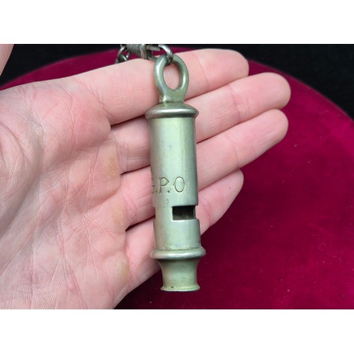 74 - An Antique GPO Whistle together with a Vintage Tommy Lighter