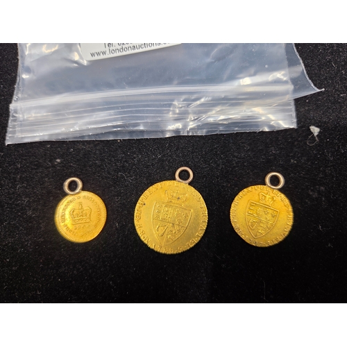 123 - George III Gold Coins: A 1788 Guinea, 1797 Half Guinea and 1806 Third Guinea, All Ex-Mounted (16g)