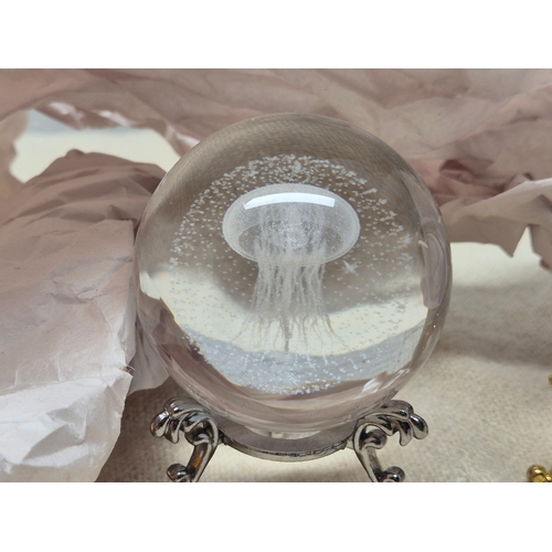 56 - Two Decorative Crystal Balls, one containing a Jellyfish and another