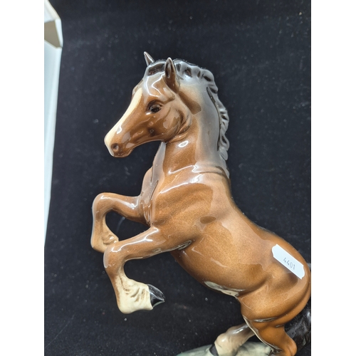 51 - A Beswick Welsh Cob Rearing Horse 1014 (approx 26cm tall)