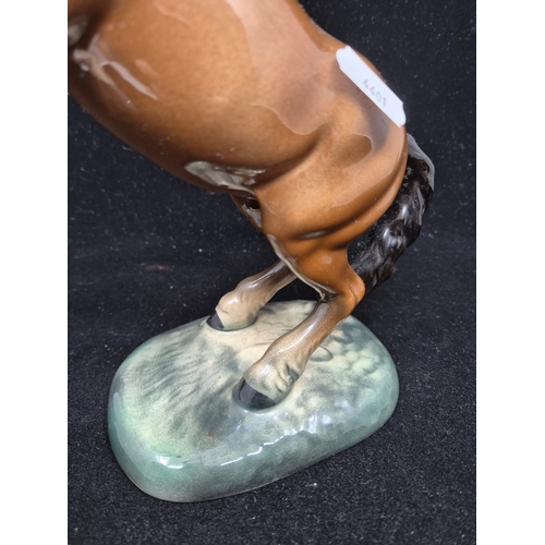 51 - A Beswick Welsh Cob Rearing Horse 1014 (approx 26cm tall)