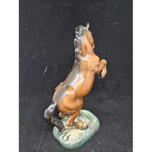 51 - A Beswick Welsh Cob Rearing Horse 1014 (approx 26cm tall)