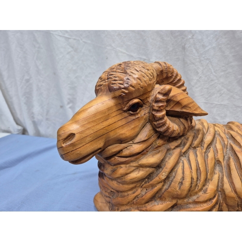 689A - A good quality Wooden Ram Statue (approx 55cm long)