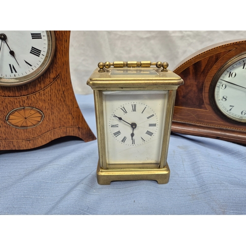 668A - Two Vintage French Mantel Clocks together with a Brass Carriage Clock