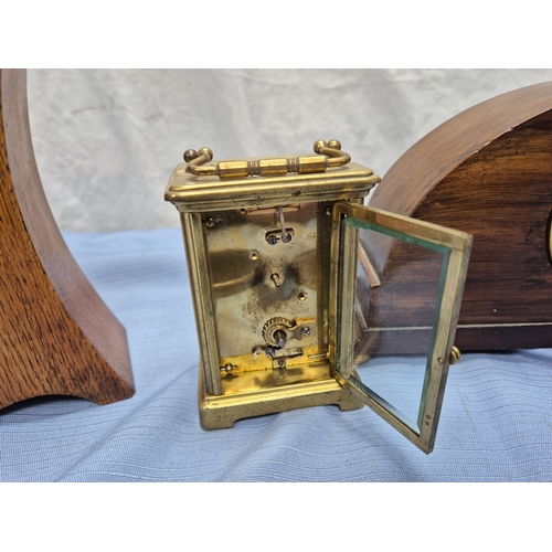 668A - Two Vintage French Mantel Clocks together with a Brass Carriage Clock