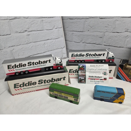 668D - A mixed lot of vintage and collectable items to include die-cast model vehicles including boxed Eddi... 