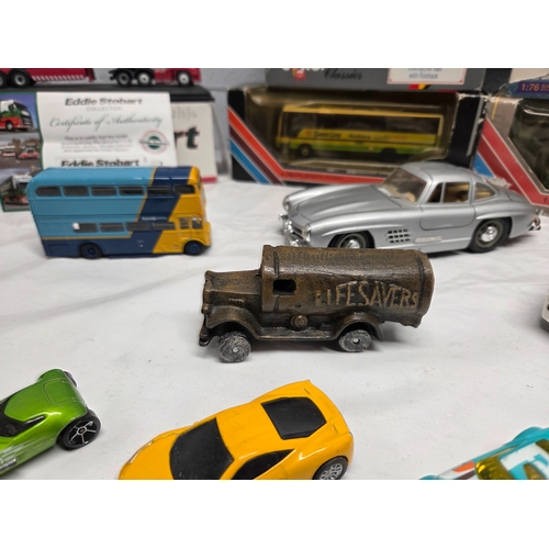 668D - A mixed lot of vintage and collectable items to include die-cast model vehicles including boxed Eddi... 
