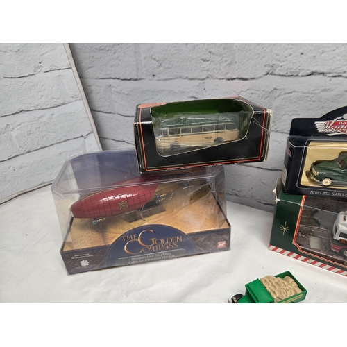 668E - A mixed collection of Die-Cast Model Vehicles to include boxed Eddie Stobart articulated lorries, Ma... 