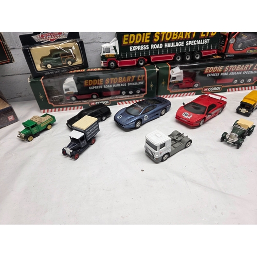 668E - A mixed collection of Die-Cast Model Vehicles to include boxed Eddie Stobart articulated lorries, Ma... 