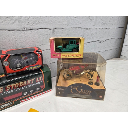 668E - A mixed collection of Die-Cast Model Vehicles to include boxed Eddie Stobart articulated lorries, Ma... 