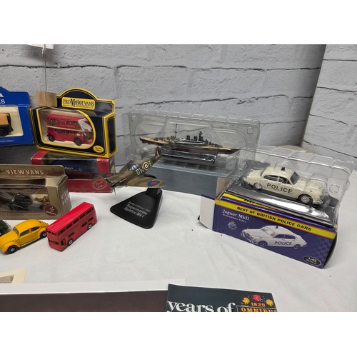 668F - A Collection of Toy Cars, Planes etc to include Atlas Editions, Corgi, Bburago